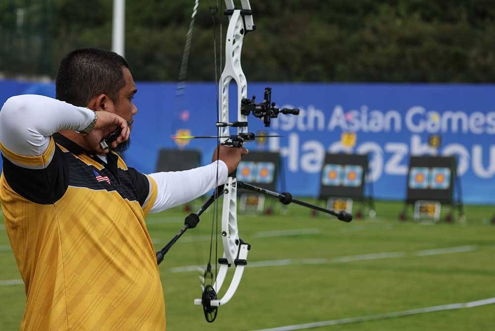 Juwaidi tersingkir di peringkat suku akhir acara compound setelah tewas kepada pemanah Korea Selatan di Pusat Sukan Fuyang Yinhu pada Selasa. - Foto Bernama