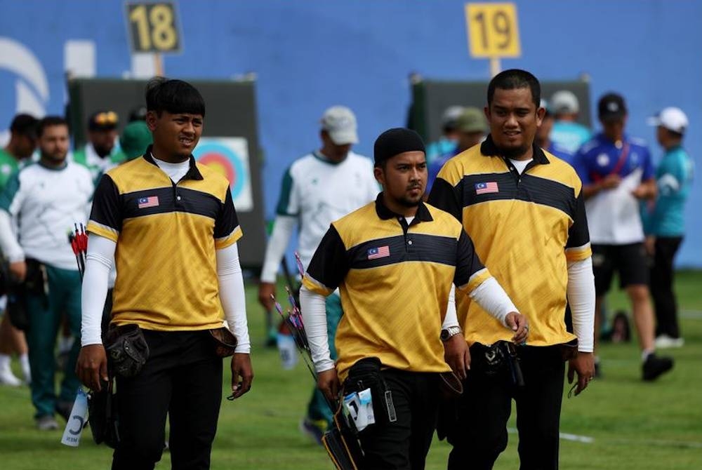 Kilauan pingat yang dinanti-nantikan itu disumbangkan trio Mohd Juwaidi Mazuki, Alang Ariff Aqil Muhammad Ghaz dan Mohamad Syafiq Md Ariffin. - Foto Bernama