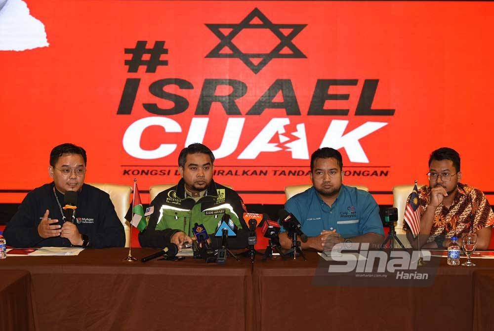 Dari kiri, Ahmad Fahmi, Nadir Al-Nuri dan Ahmad Sani pada sidang media Operasi Taufan Al-Quds dan Serangan Rejim Israel ke atas Gaza di pejabat Mapim pada Isnin. - Foto Sinar Harian/MOHD RAFIQ REDZUAN HAMZAH