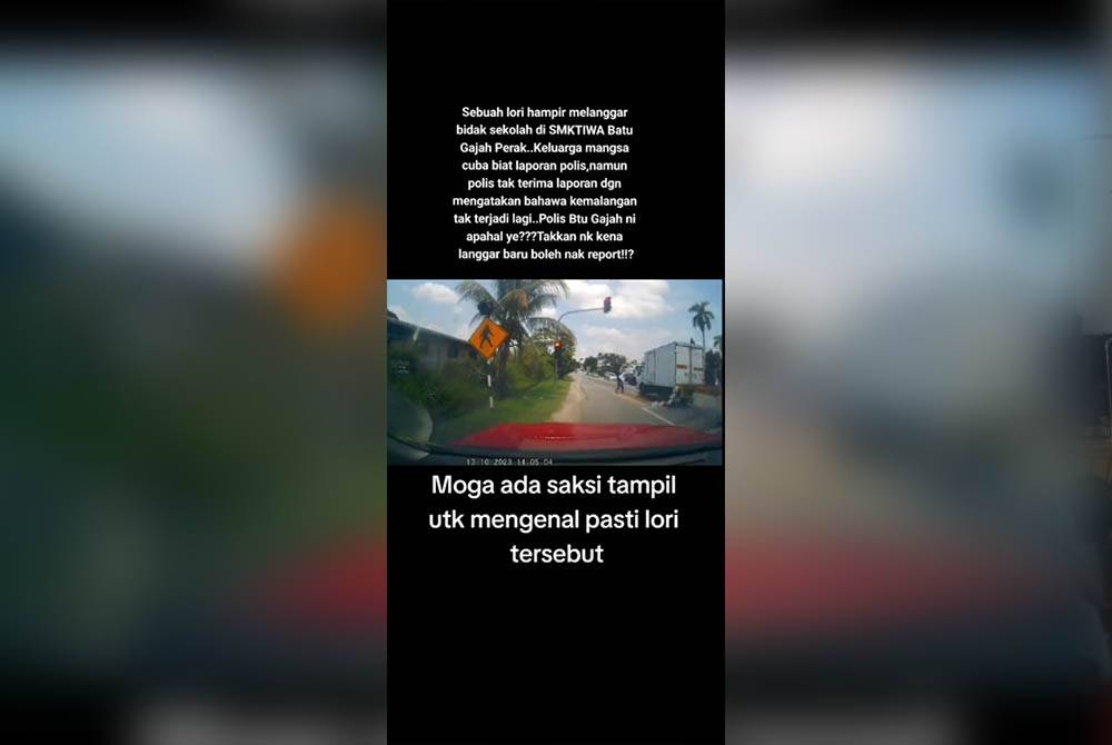 Tangkap layar menunjukkan seorang pelajar perempuan nyaris dilanggar lori ketika sedang melintas jalan untuk ke sekolahnya di Batu Gajah.