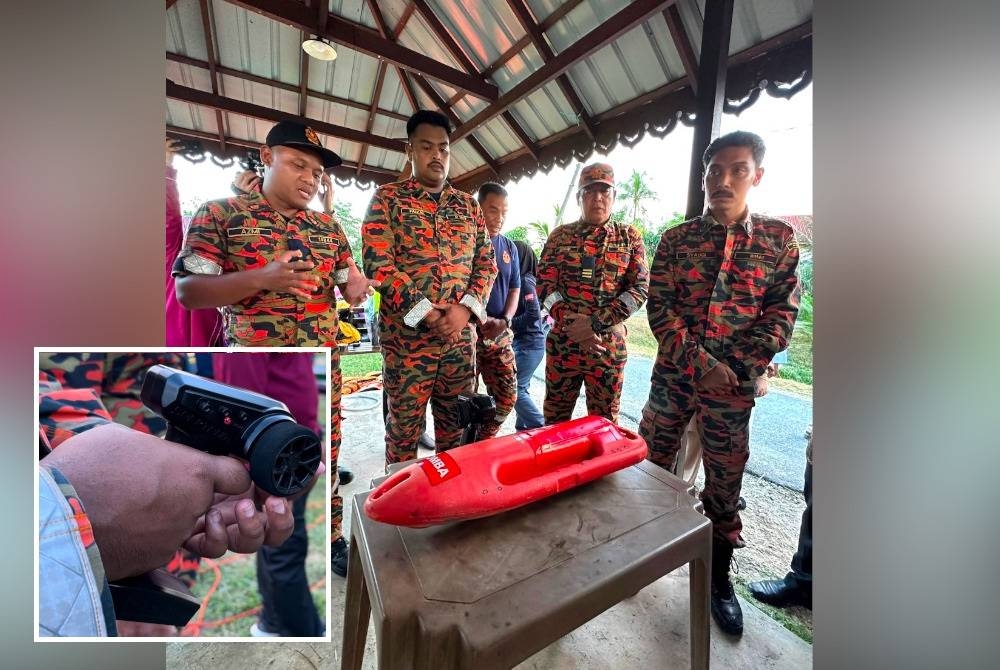 Mohd Azmi (kiri) memberi penerangan berkaitan RBC yang dicipta oleh bomba Pasir Mas. Gambar kecil: Alat kawalan jauh yang digunakan untuk mengawal RBC.