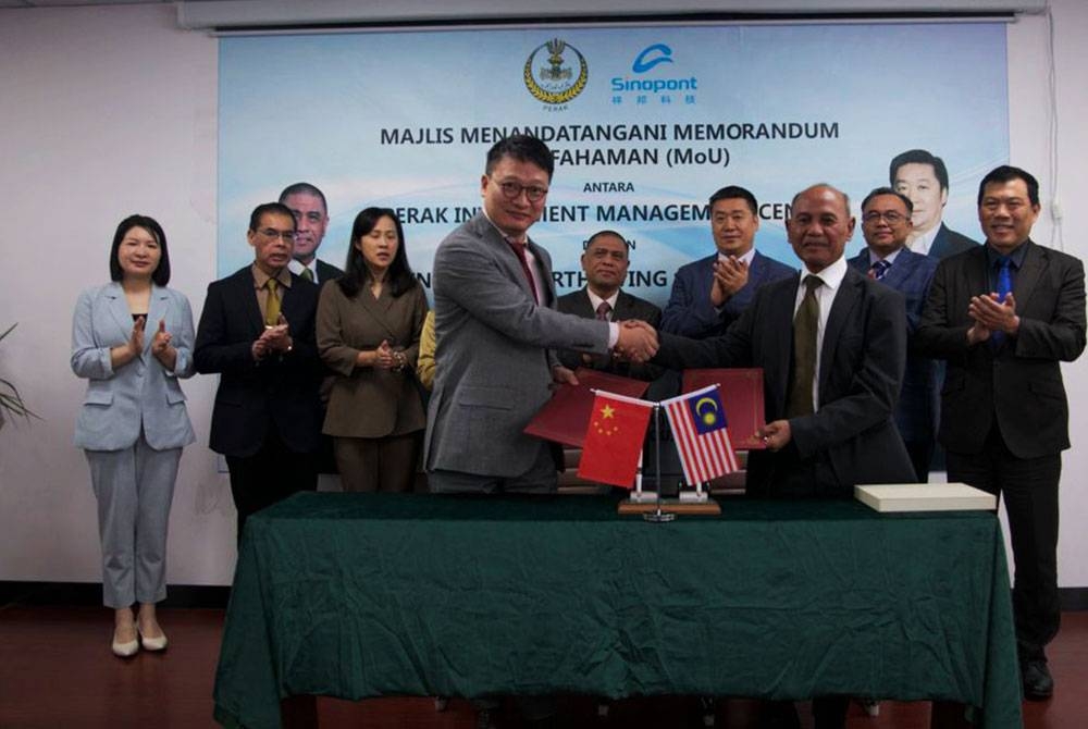 Majlis menandatangani MoU antara Zhejiang Sinopont Technology Co Ltd dengan InvestPerak.