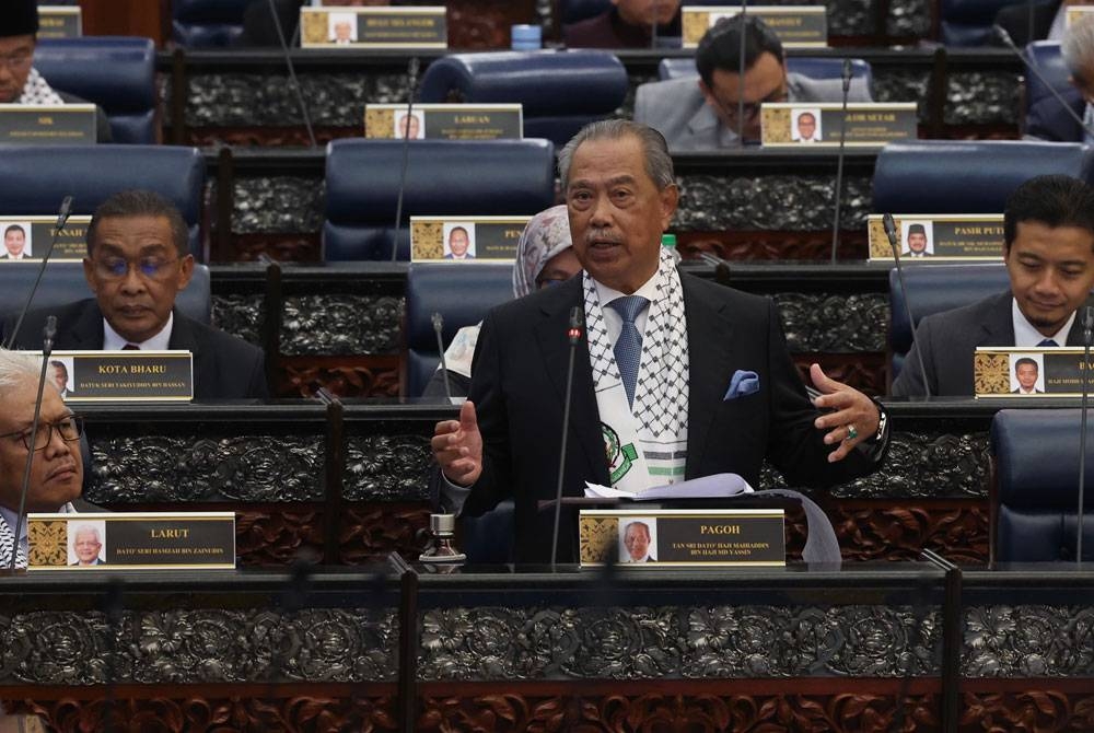 Muhyiddin ketika Sidang Dewan Rakyat di Bangunan Parlimen hari ini. - Foto Bernama