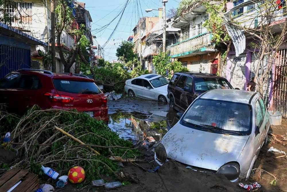 
Keadaan kerosakan yang disebabkan oleh Taufan Otis di Acapulco, negeri Guerrero, Mexico. - Foto AFP