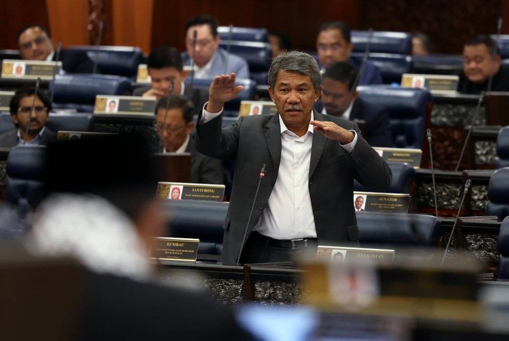 Mohamad merangkap Ahli Parlimen Rembau ketika Sidang Dewan Rakyat di Bangunan Parlimen hari ini. - Foto Bernama