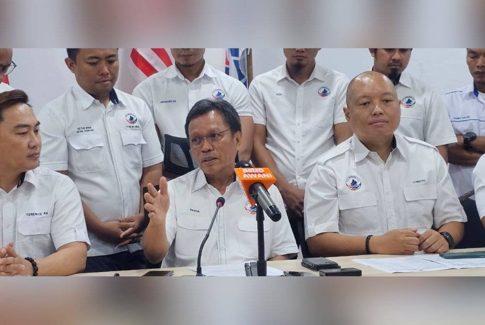 Mohd Shafie dalam sidang akhbar di ibu pejabat Warisan, Kota Kinabalu.