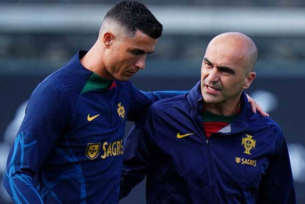 Martinez (kanan) bersama Ronaldo menutup mulut pengkritik setelah membawa Portugal mara ke saingan Euro 2024. Foto Agensi.