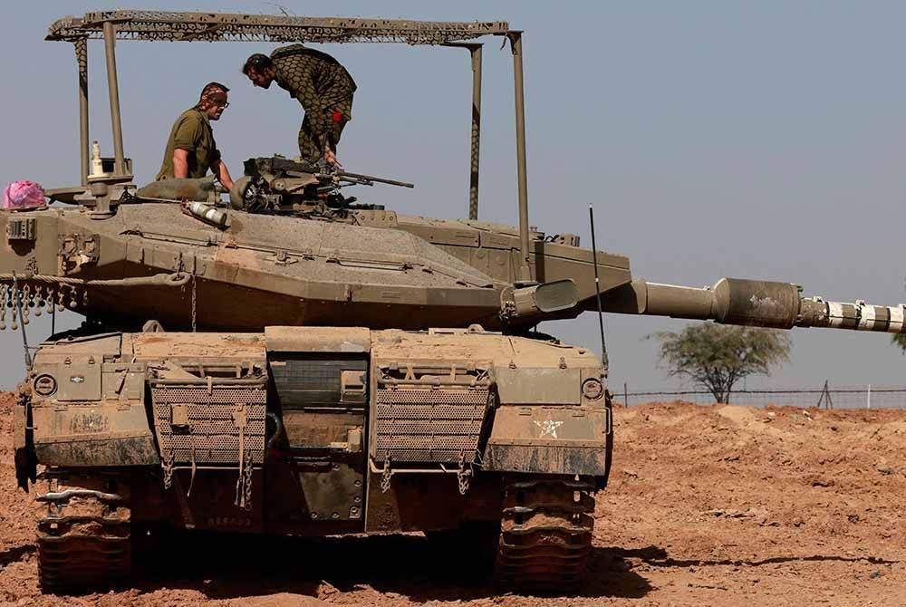 IFJ akan mengadakan mesyuarat pada Selasa dan Rabu depan bagi membincangkan untuk mengemukakan aduan berkaitan jenayah Israel terhadap wartawan Palestin kepada ICC. - Foto AFP