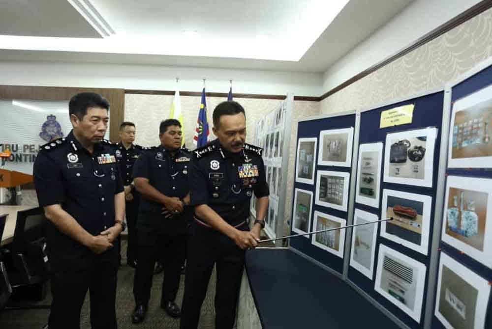 Mohd Yusri menunjukkan paparan hasil Op Tapis yang dijalankan serentak seluruh negeri selama tiga hari bermula Isnin lalu dalam sidang akhbar pada Jumaat.