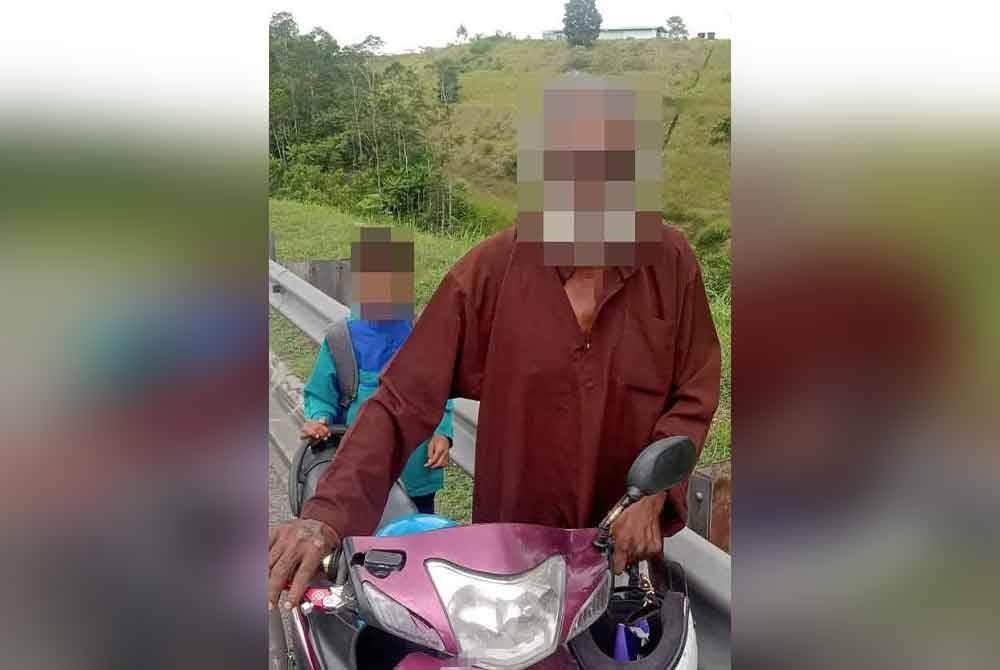 Menolak motosikal sambil membawa anak taktik digunakan seorang lelaki bagi memperdaya pengguna lebuh raya.