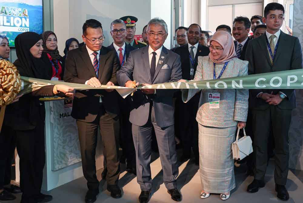 Yang di-Pertuan Agong Al-Sultan Abdullah dan Raja Permaisuri Agong, Tunku Azizah Aminah Maimunah Iskandariah ketika acara Climate Talks For A Green Future di Pavilion Turkiye di Dubai pada Jumaat. - Foto: Bernama