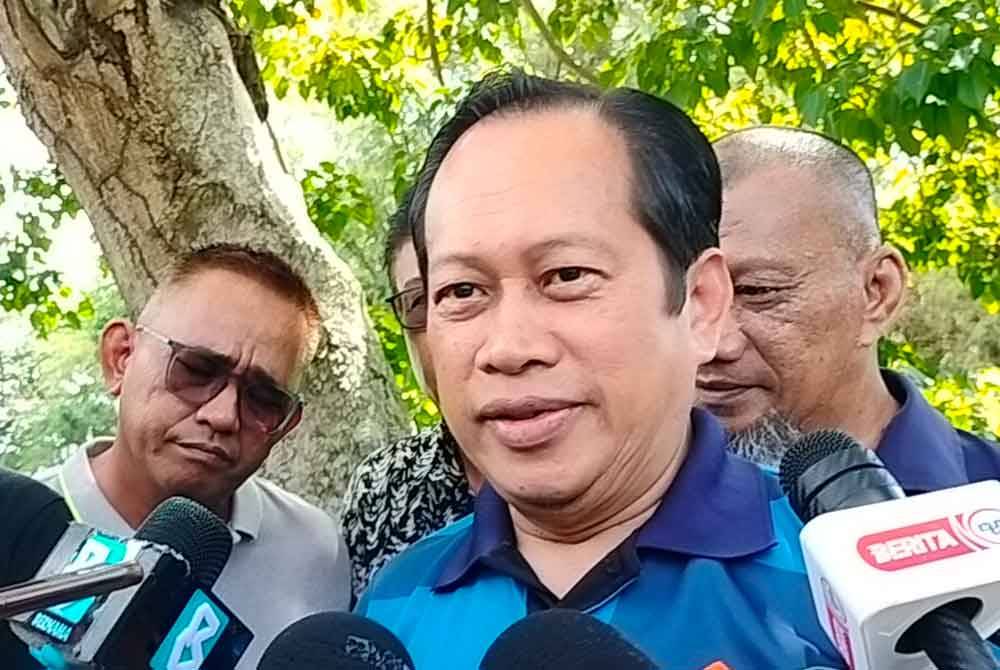 AHMAD MASLAN