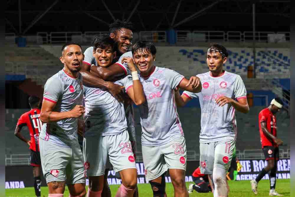 Pemain PDRM meraikan jaringan gol ketika menentang Kelantan FC pada perlawanan Liga Super di Kelana Jaya pada Ahad.