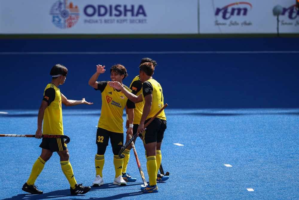 Barisan pemain Malaysia meraikan kejayaan selepas menewaskan Mesir di Stadium Hoki Nasional pada Isnin lalu. - Foto Bernama