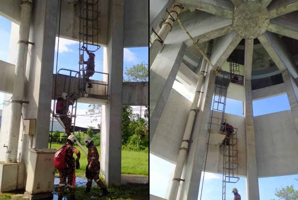 Anggota bomba menyelamatkan seorang wanita yang cuba terjun dari tangki air di Pasar Awam Bagan Serai di Kerian. - Foto Bomba