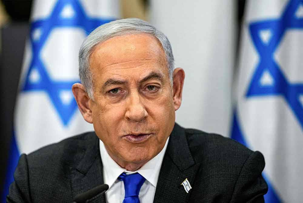 Netanyahu menjadi mangsa lepas geram keluarga tebusan yang ditahan kumpulan pejuang Hamas di Gaza, pada Isnin. - Foto AFP