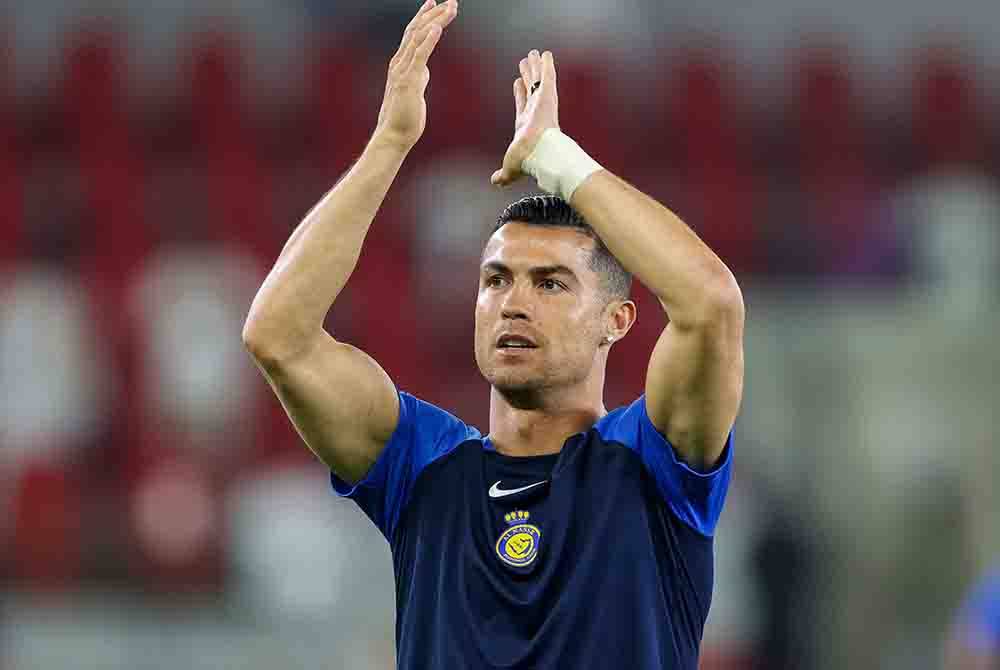 Ronaldo ketika menjelang perlawanan bola sepak Liga Pro Saudi antara Al-Ittihad dan Al-Nassr di Stadium King Abdullah Sports City di Jeddah pada Selasa. - Foto AFP