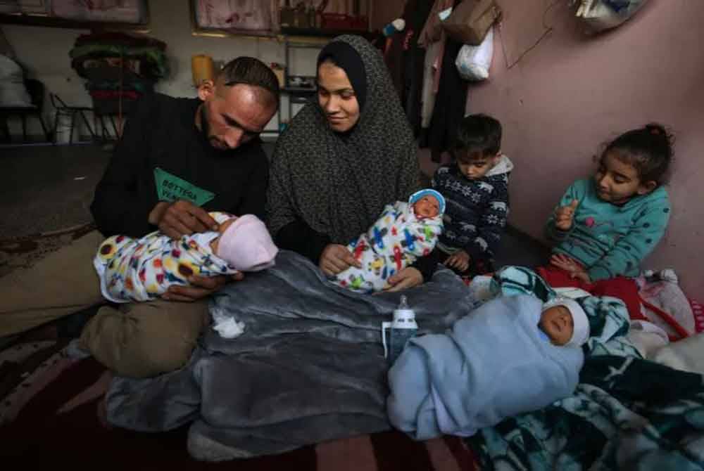 Iman antara wanita yang bernasib baik dan terselamat dalam perang ganas itu. - Foto: AFP