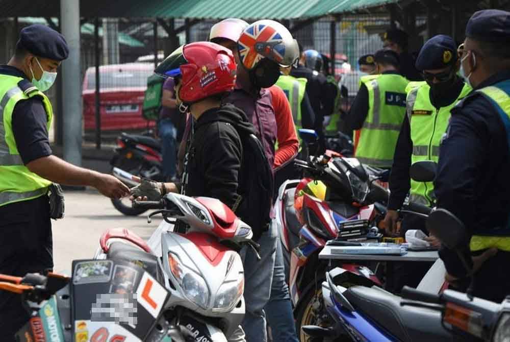 JPJ akan bekerjasama dengan jabatan serta agensi lain dalam menangani sikap penunggang motosikal. (Gambar hiasan) - Foto Bernama