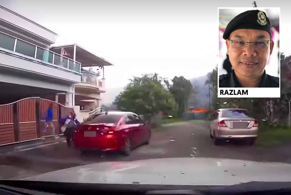 Tangkap layar video dashcam yang berjaya merakam kelibat dua lelaki keluar daripada pagar rumah mangsa dan melarikan diri dengan menaiki kereta jenis Honda City berwarna merah di Taiping, Selasa lalu. Foto ihsan pembaca 