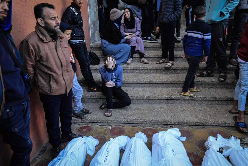 Konflik Palestin-Israel meragut lebih 20,000 nyawa termasuk kanak-kanak dan wanita. Foto AFP