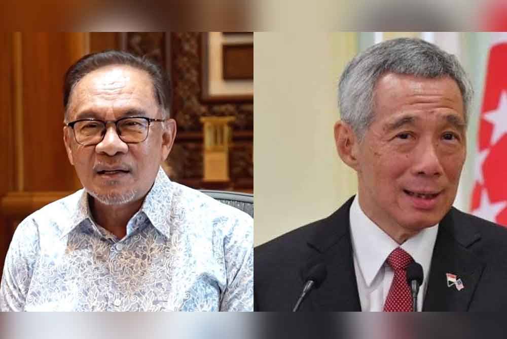 Anwar (kiri), Hsien Loong