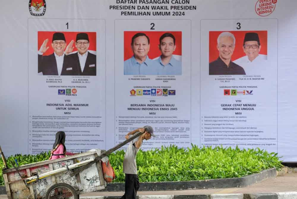 Pilpres 2024 yang menampilkan tiga pasangan capres dan cawapres pada 14 Februari ini dijangka sengit. - Foto: AFP