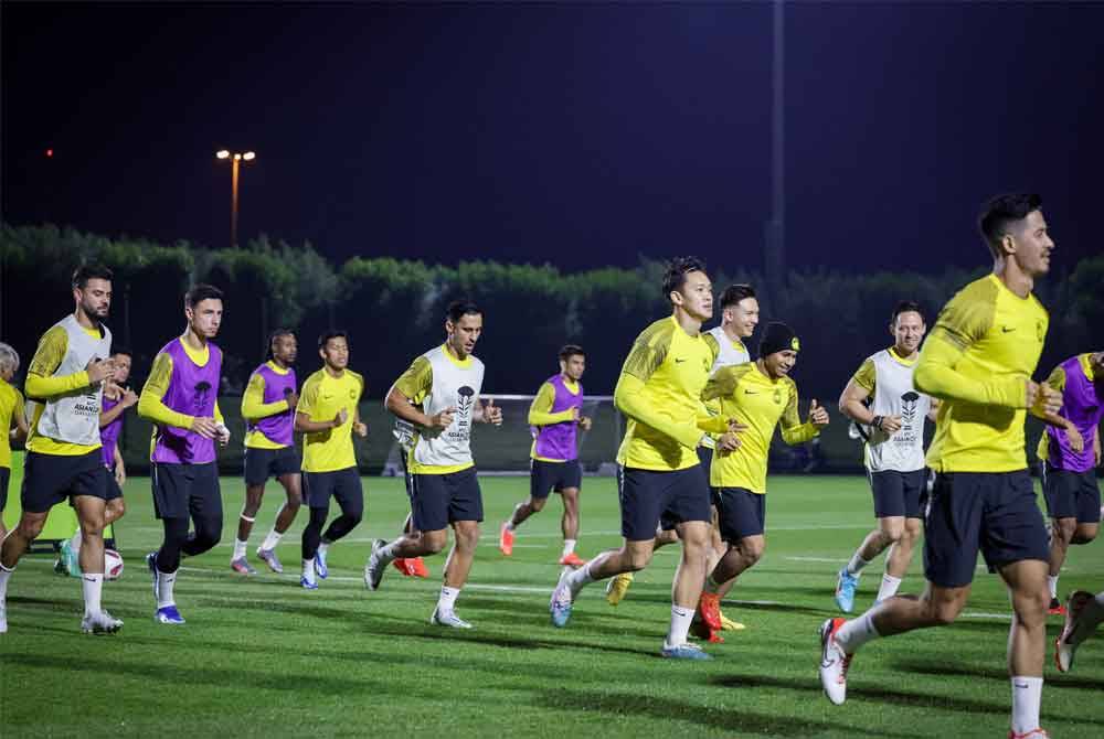 Skuad Harimau Malaya giat menjalani latihan ketika menjalani sesi latihan dalam menghadapi Piala Asia 2023 di Universiti Qatar. Foto Bernama