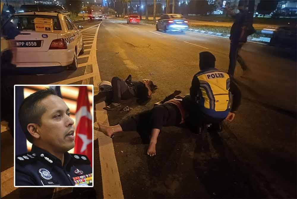 Pasangan OKU mengalami kecederaan selepas dilanggar treler yang dipercayai mengalami masalah brek semasa sekatan jalan raya di Seksyen 21, Shah Alam pada Selasa. Gambar kecil:Mohd Iqbal