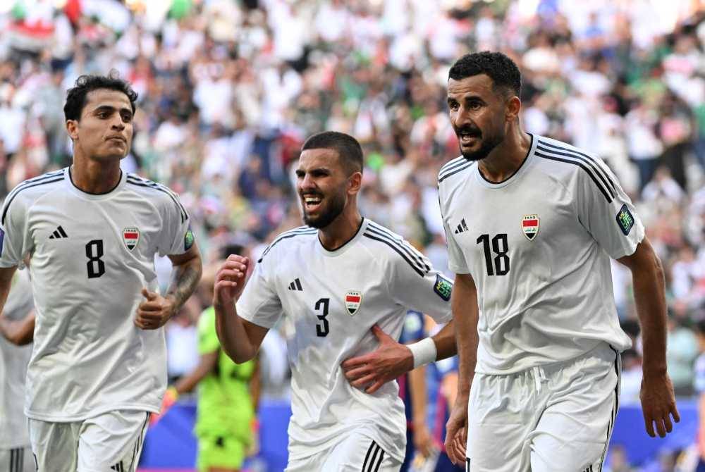 Aymen meraikan jaringan bersama pemain Iraq lain selepas meldak gol kedua pasukan ketika berdepan Jepun dalam aksi Kumpulan D di Stadium Education City, Al-Rayyan. Foto AFP