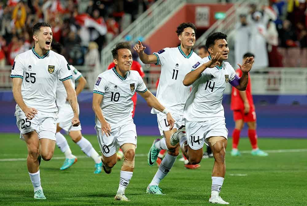 Asnawi Mangkualam meraikan jaringan gol pertama Indonesia ketika berdepan Vietnam di Stadium Abdullah bin Khalifa, Doha. Foto AFP