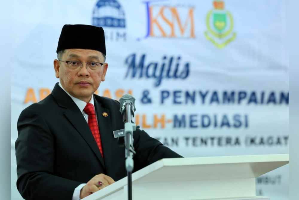 Mohd Na&#039;im ketika berucap pada Majlis Apresiasi Dan Penyampaian Sijil Profesional Kemahiran Sulh_Mediasi (USIM-JKSM) untuk anggota KAGAT di Jabatan Kehakiman Syariah hari ini. Foto Bernama