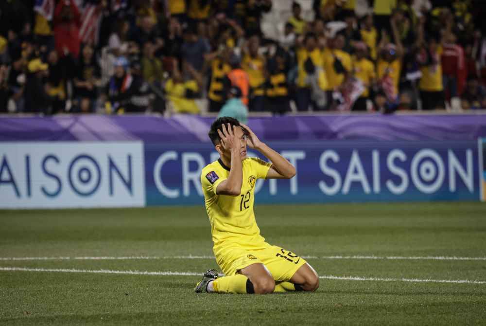 Reaksi pemain skuad Harimau Malaya, Arif Aiman Hanapi ketika perlawanan di antara Malaysia menentang Bahrain peringkat kumpulan E Piala Asia 2023 di Stadium Jassim Bin Hamad. Foto Bernama