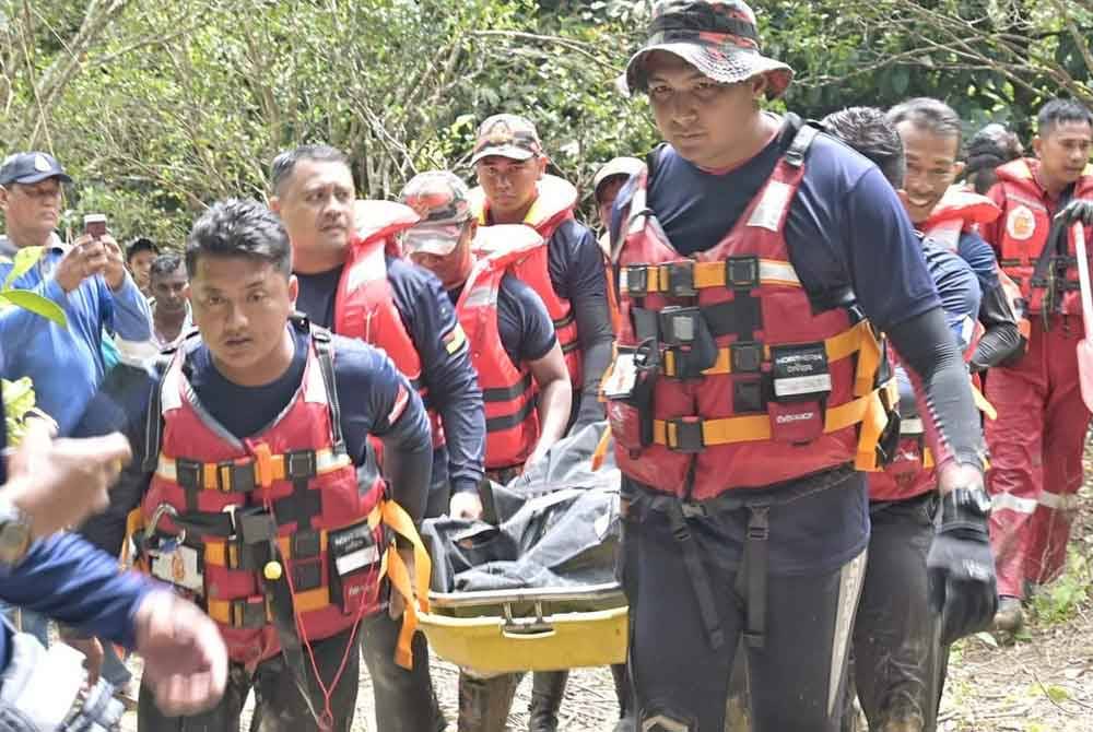 Mayat mangsa ditemukan tersangkut pada pokok pada jam 12.44 tengah hari Khamis. Foto pembaca