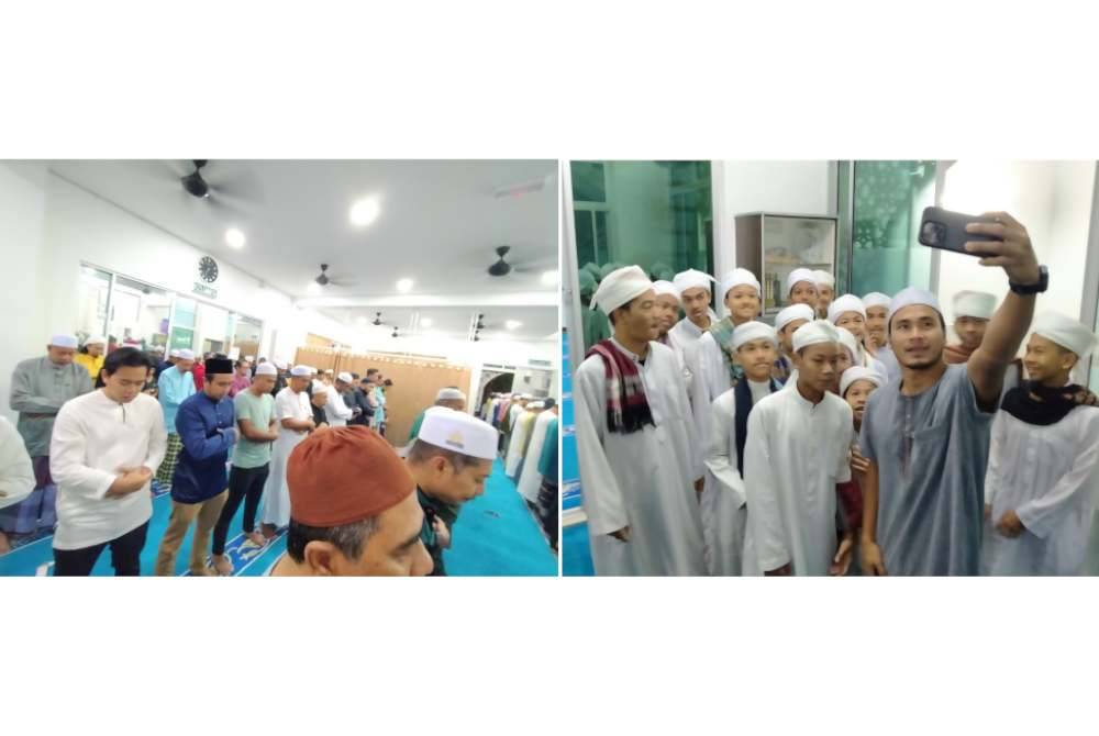 Wan Zack bergambar bersama sebahagian jemaah selepas menunaikan solat Subuh berjemaah di Surau Raja Hairani, Taman Meru Perdana 2 di sini pada Ahad.