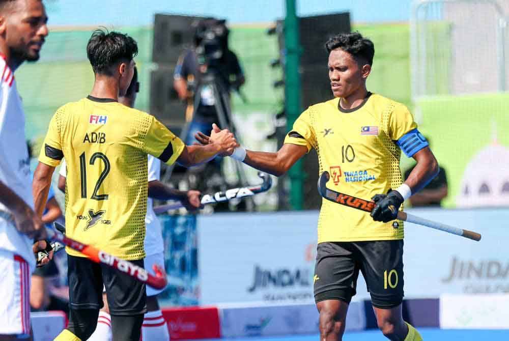 Akhimullah Anuar antara penjaring gol ketika Malaysia menentang Oman dalam aksi pembukaan Kumpulan D Piala Dunia Hoki 5s di Muscat, Oman pada Ahad. Foto: International Hockey Federation (FIH)