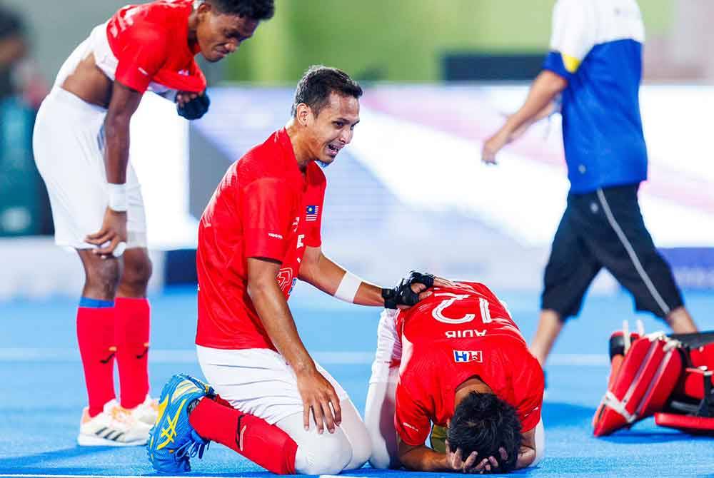 Pemain negara meraikan kejayaan mara ke perlawanan akhir selepas menewaskan Poland. Foto: International Hockey Federation (FIH).