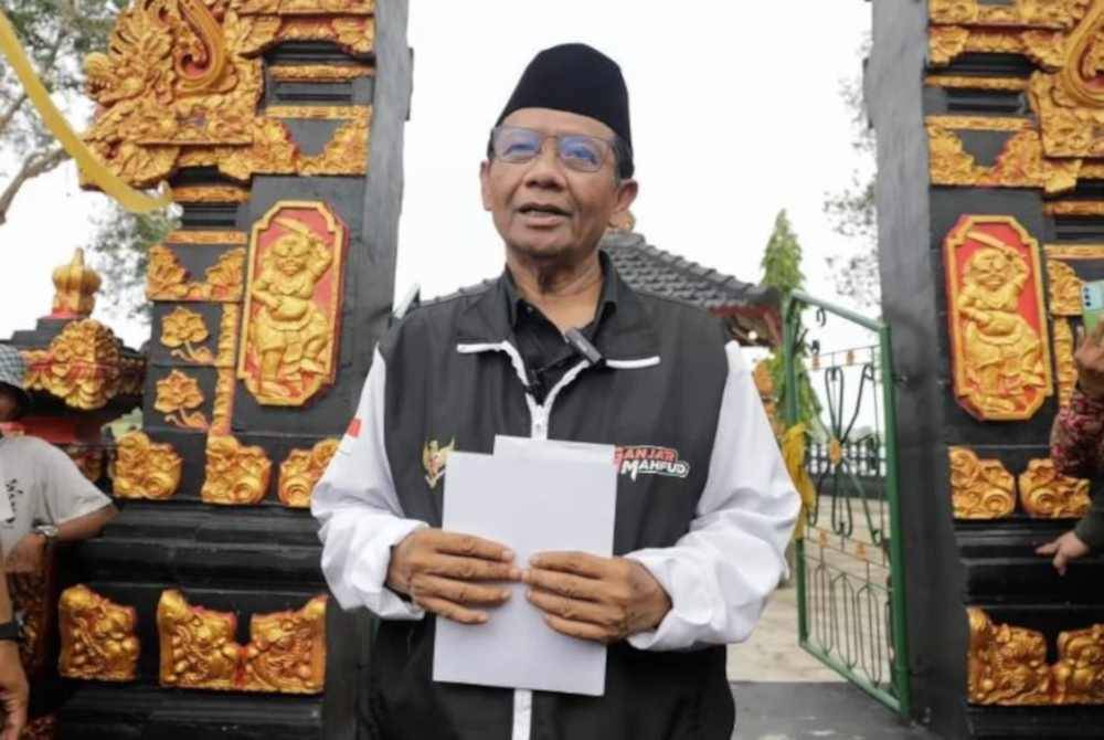 Mahfud MD dilaporkan mengikut saranan pasangan regunya, Ganjar untuk melepaskan jawatan menteri. Foto Agensi