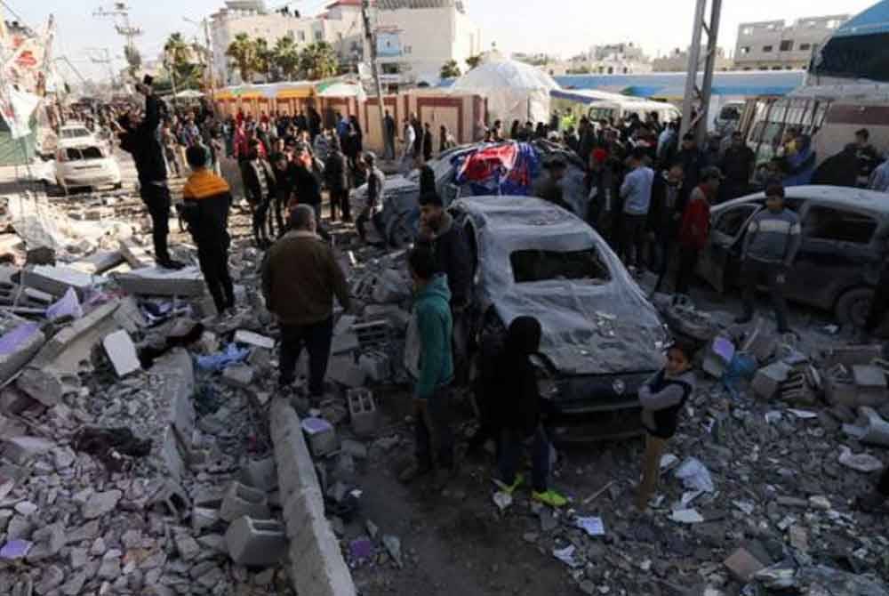 Tentera Israel turut berundur dari kawasan Al-Muqawsi, Menara Perisikan, Bahloul, dan Jalan Rashid di bandar Gaza - Foto fail/REUTERS/Mohammed Al-Masri