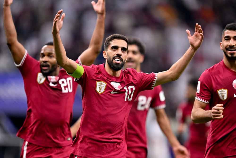 Para pemain Qatar meraikan kemenangan selepas mengesahkan kemaraan ke peringkat separuh akhir Piala Asia 2023. Foto Agensi