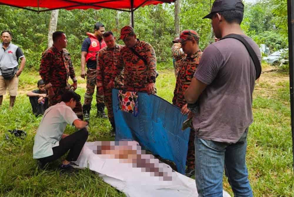 Mayat mangsa OKU ditemukan lemas di dasar sungai dengan kedalaman tujuh meter di Air Terjun Berkelah, Kuantan pada Sabtu. Foto JBPM Pahang