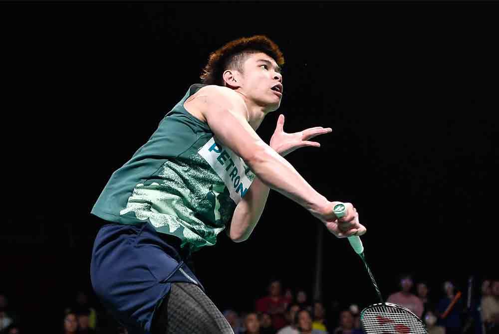 Jun Hao ketika beraksi menentang lawannya dari China Weng Hong Yang dalam Kejohanan Akhir Badminton Berpasukan Asia (BATC) 2024 di Pusat Konvensyen Setia City (SCCC) hari ini. Foto Bernama