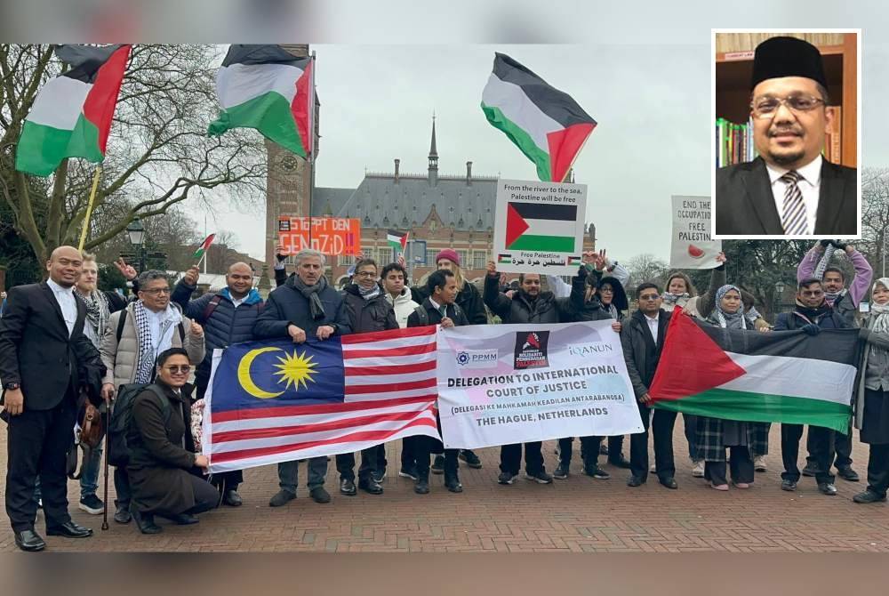 Selesai pendengaran di ICJ, delegasi Malaysia di sambut oleh demonstran yang menunggu di luar mahkamah. Foto FB Datuk Zainul Rijal Abu Bakar