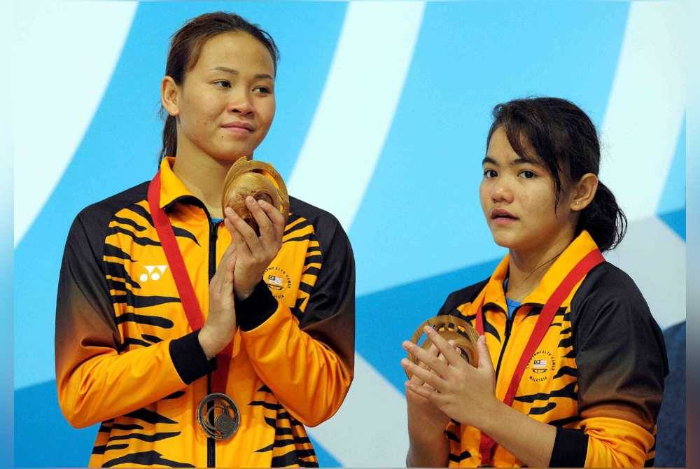 Mesyuarat Jawatankuasa RTG menggugurkan nama Pandelela (kiri) dan Nur Dhabitah dalam program ke Sukan Olimpik Paris 2024 itu.