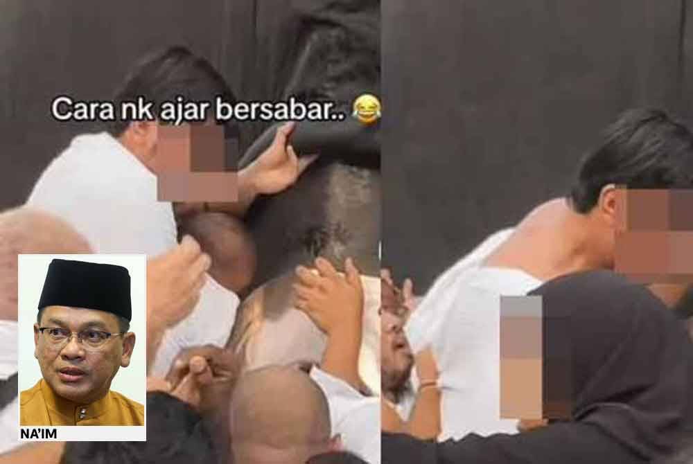 Tangkap layar rakaman video tular yang menunjukkan momen pempengaruh media sosial dan pasukannya bergelut dengan jemaah umrah lain dari serata dunia untuk mencium hajarul aswad ketika menunaikan umrah baru-baru ini.