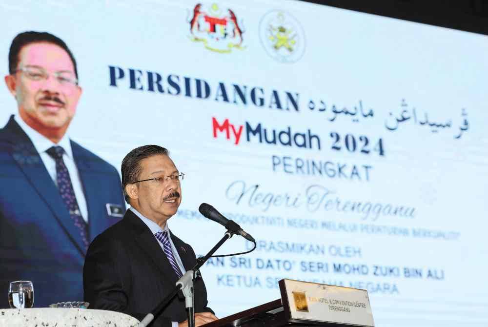 Mohd Zuki berucap pada Majlis Perasmian Persidangan MyMudah 2024 Peringkat Terengganu di sebuah hotel di, sini pada Ahad. Foto Bernama
