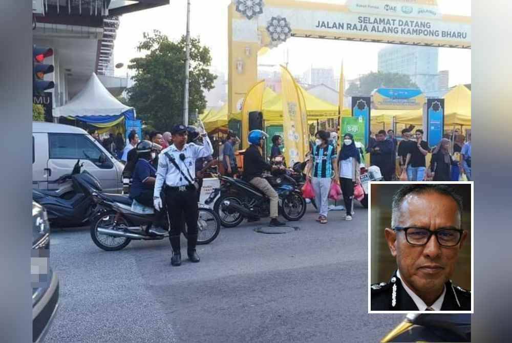 Anggota JSPT mengawal aliran trafik di Kampong Bharu, di sini. (Gambar kecil: Mohd Azman)