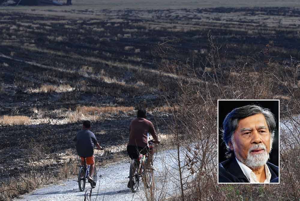 Pemandangan kawasan sawah padi yang kering kontang berikutan cuaca panas ketika tinjauan di Perlis. Foto Bernama (Gambar kecil: Azizan)