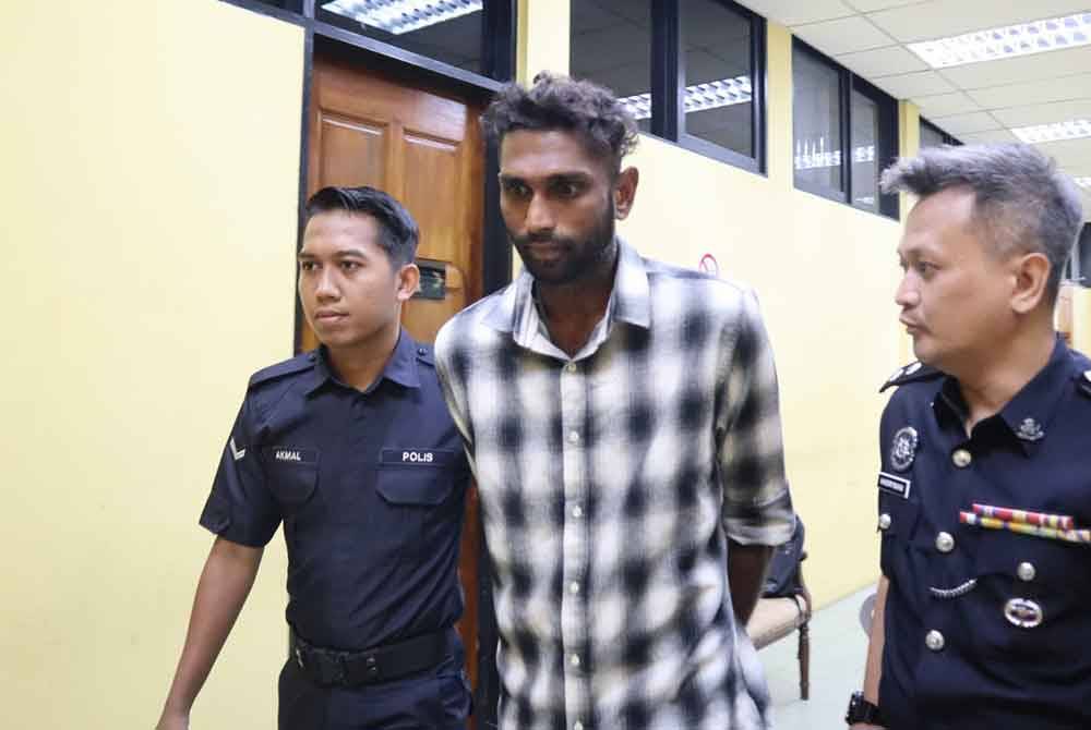 Nalenthiran dibawa keluar dari Mahkamah Sesyen Teluk Intan selepas mengaku tidak bersalah atas pertuduhan melakukan amang seksual terhadap kanak-kanak perempuan berusia 11 tahun.