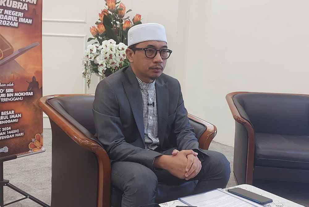 Muhammad Khalil (tengah) ketika sidang akhbar